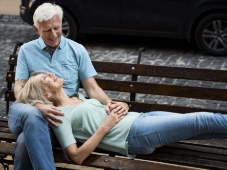 romantic-elder-couple-enjoying-their-time-bench-outdoors